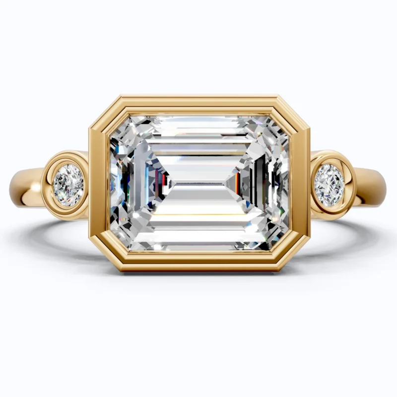 Minimalist Emerald Cut Bezel Accent Three Stone Engagement Ring